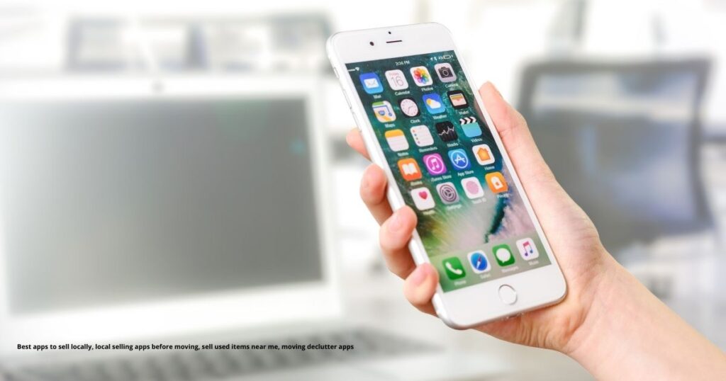 Boxes by the door and a phone listing items — Best Apps for Selling Stuff Locally Before Moving to a New House