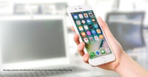 Boxes by the door and a phone listing items — Best Apps for Selling Stuff Locally Before Moving to a New House