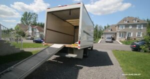 Movers Shady Side MD loading furniture at a waterfront home